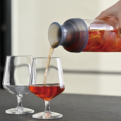 Hario cold brew carafe with loose leaf tea steeping in glass — THISISnotCOFFEE